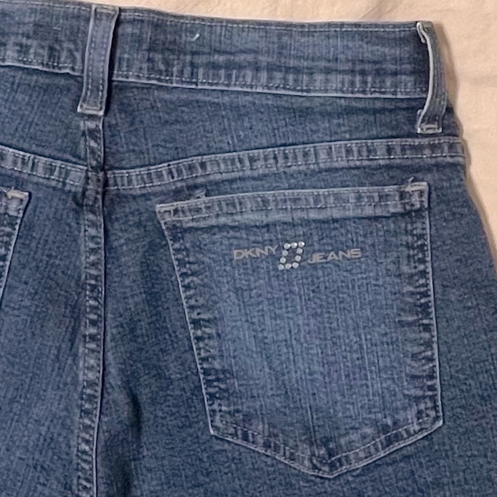 Vintage DKNY Blue Jeans, rhinestone embellished logo on back pocket.  size 4